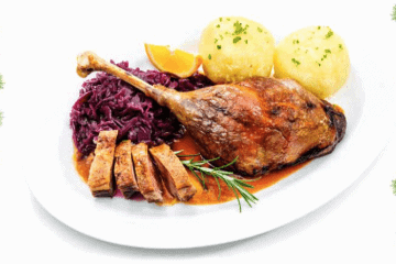 gebratener Gänsefuß mit Knödeln und Rotkraut